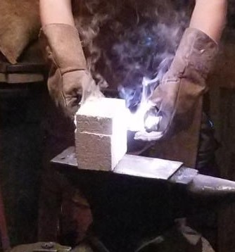 Melting copper with his arc furnace